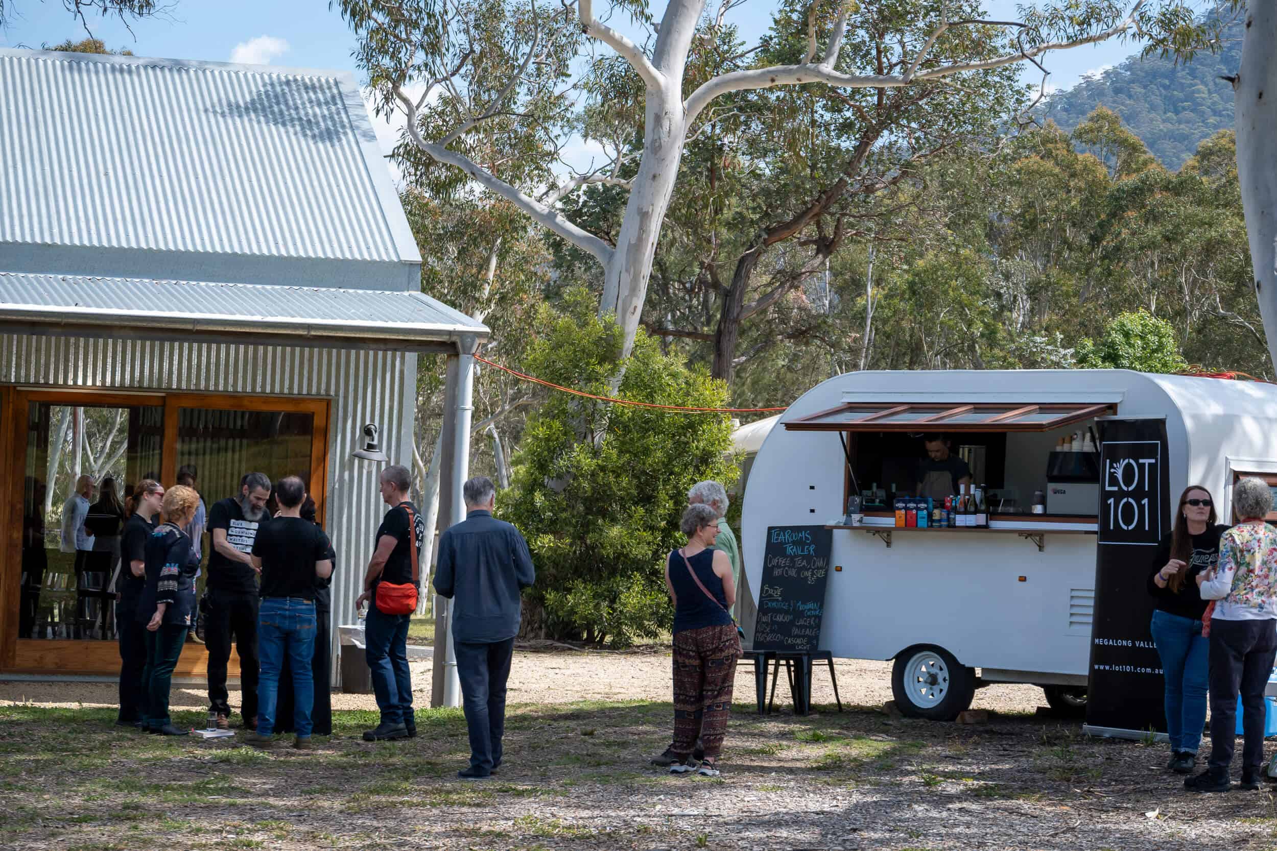People line up at LOT 101 food truck during Lyrebird Festival 2026.